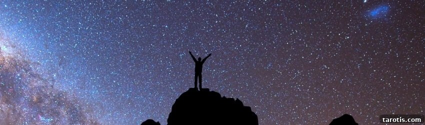 Weekly Astrology Forecast: August 30–September 5, 2021 2 A shadowed figure stands on top of a cliff, facing the night sky.