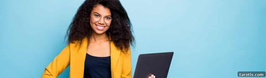 Aries Rising in Esoteric Astrology: Traits, Purpose & Spiritual Path 2 business woman smiling holding a laptop
