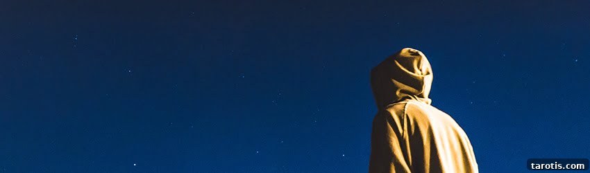 Weekly Astrology Forecast: January 25–31, 2021 — What to Expect 2 A person in a raincoat looks up at the stars.