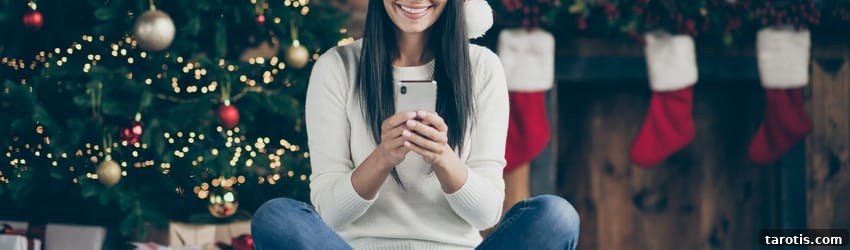 Holiday Communication Tips Tailored to Mercury Signs 2 woman-on-video-call-christmas-tree-in-background