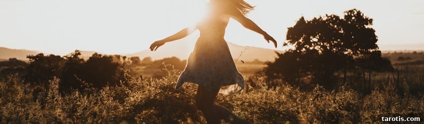 Scorpio Rising Meaning: Traits, Influence, and Spiritual Insights 2 girl-running-in-field-with-sunset