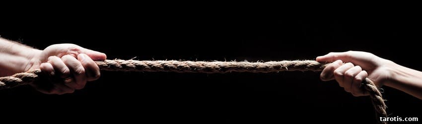 Complete Guide to Understanding the Nodes: Functions, Types & Uses 4 Two people pulling on a rope showing the opposing forces of your south and north nodes.