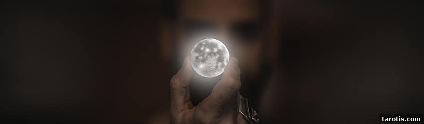 Moon Sign Astrology: Discover Your Emotional Personality and Traits 2 Person holding a full moon in front of their face.